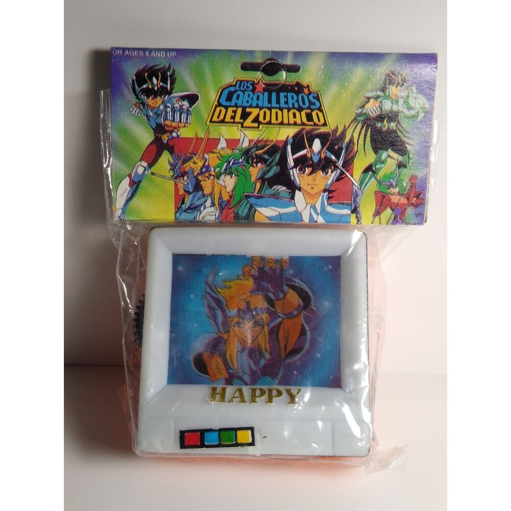 Vintage Los Caballeros Del Zodiaco Saint Seiya Mini TV Toy Sealed Orange 1980s